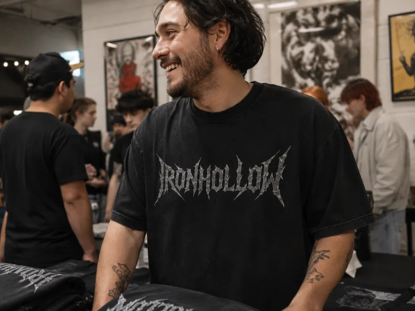 IRONHOLLOW tee worn at the merch table
